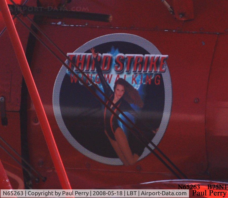 N65263, 1940 Boeing B75N1 C/N 75-3447, Carol Pilon, pretty in person as well as nose art