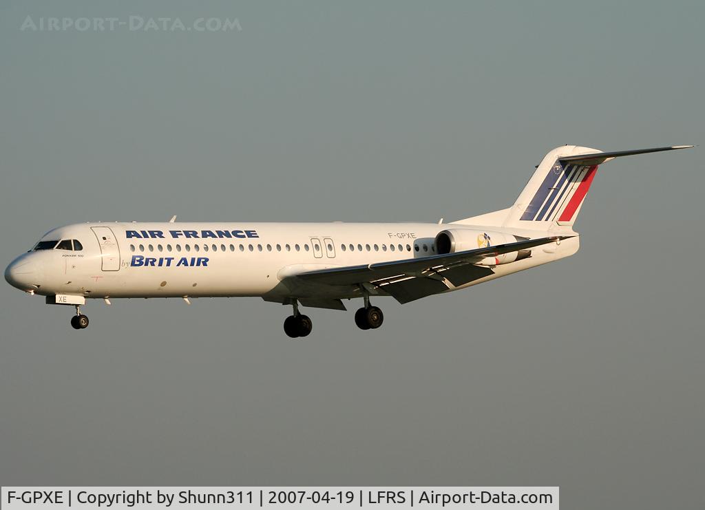 F-GPXE, 1995 Fokker 100 (F-28-0100) C/N 11495, On landing in the late afternoon...