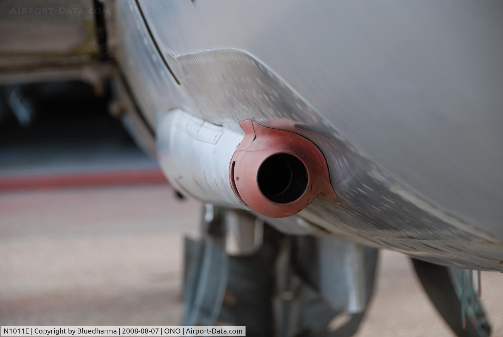 N1011E, Mikoyan-Gurevich MiG-21F-13 C/N 1011, Parked by hanger at airport.