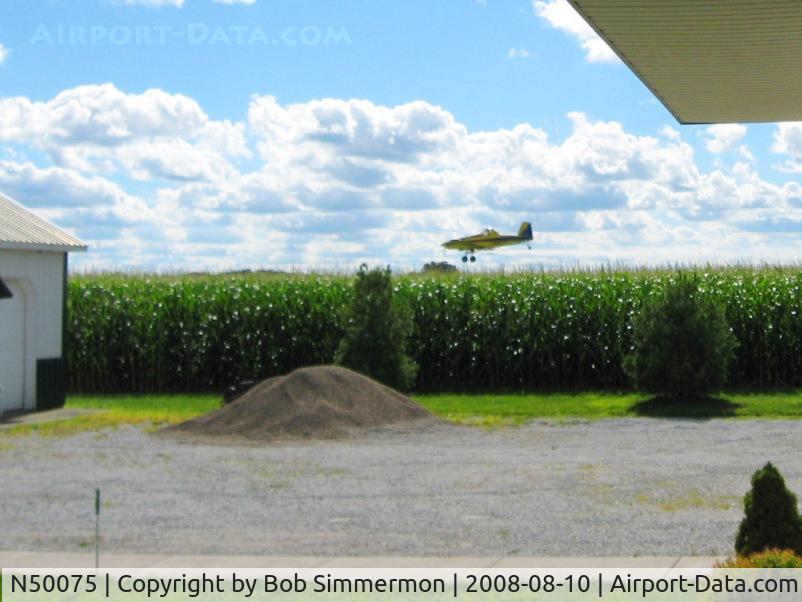 N50075, 1998 Air Tractor Inc AT-502B C/N 502B-0494, Spraying corn next to my house near La Rue, Ohio.