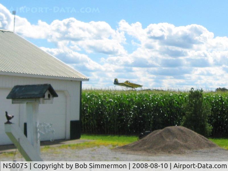 N50075, 1998 Air Tractor Inc AT-502B C/N 502B-0494, Spraying corn next to my house near La Rue, Ohio.