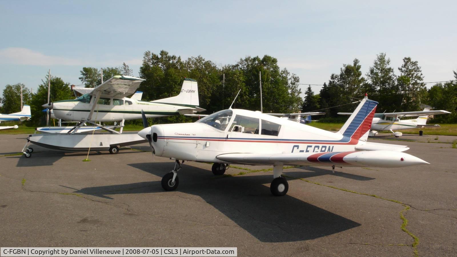 C-FGBN, 1965 Piper PA-28-140 Cherokee C/N 28-20387, C-FGBN parked next to a Cessna 185 at Lac-à-la Tortue
