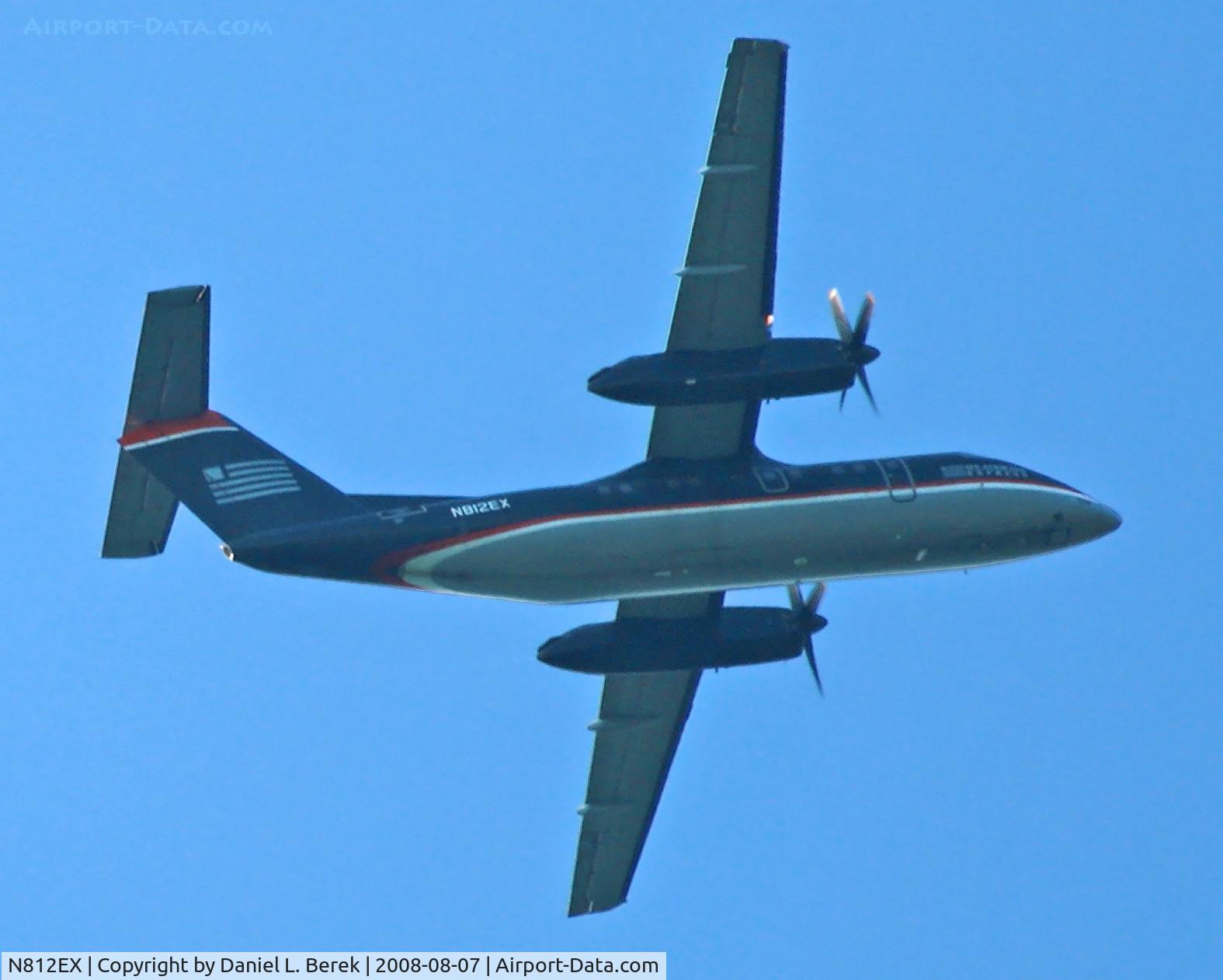 N812EX, 1991 Boeing DHC-8-102 C/N 312, Caught flying high over Ringwood State Park, New Jersey.