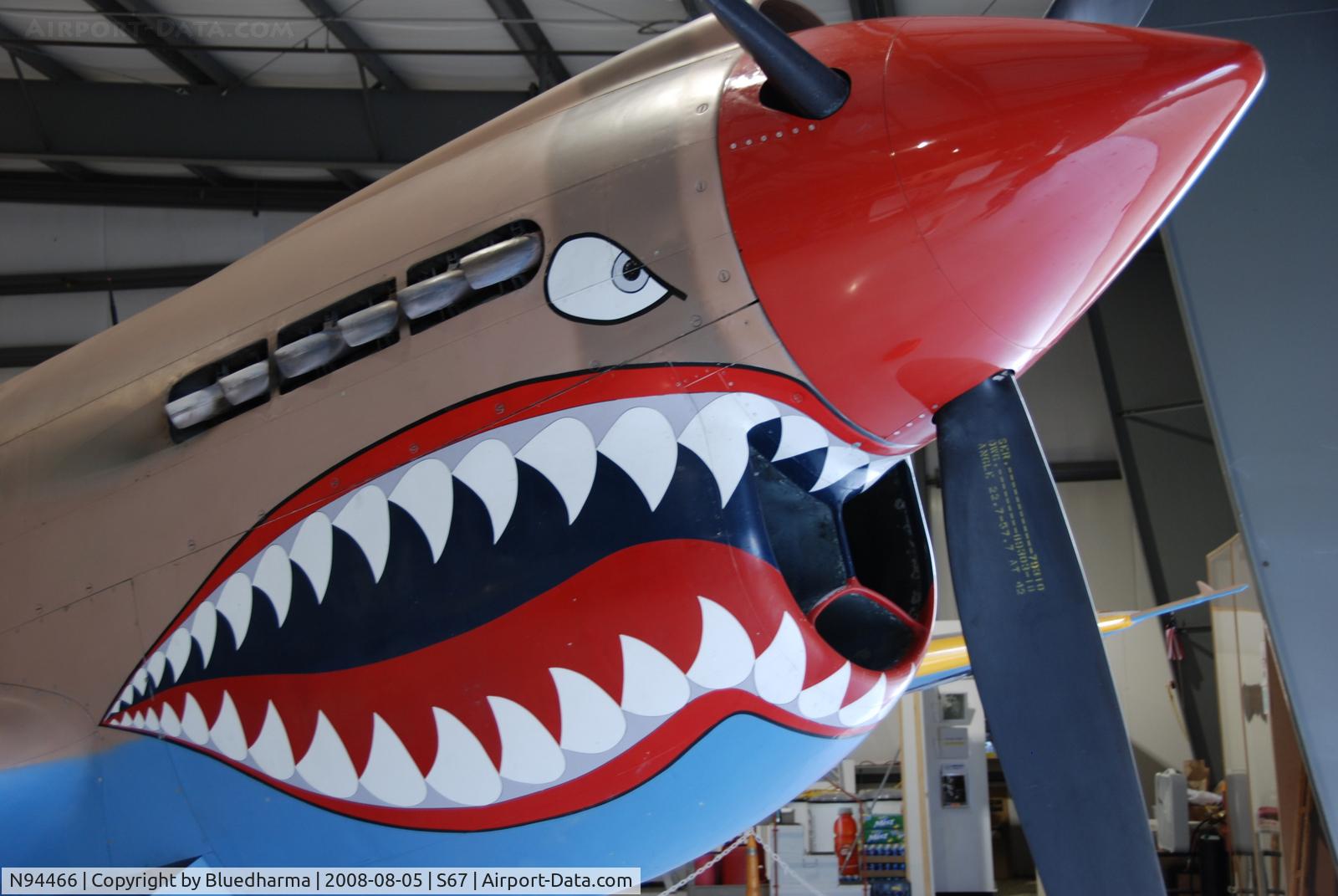 N94466, 1942 Curtiss P-40E C/N AK-899, Flying Tiger Nose art.