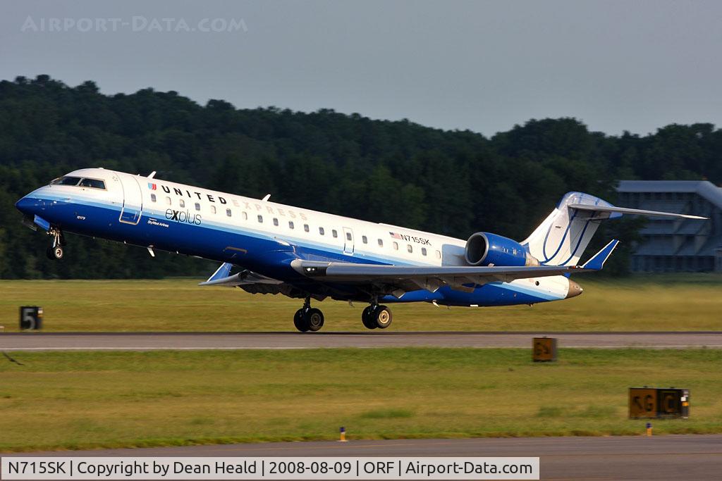 N715SK, 2004 Bombardier CRJ-700 (CL-600-2C10) Regional Jet C/N 10179, United Express (operated by SkyWest Airlines) N715SK (FLT SKW6128) departing RWY 5 enroute to Chicago O'Hare Int'l (KORD).