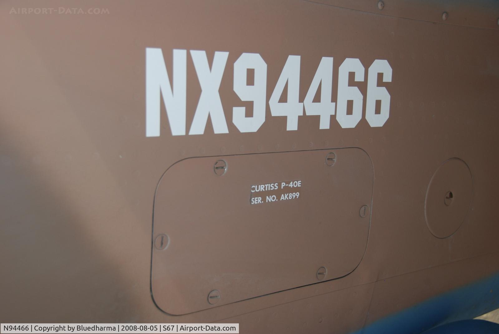 N94466, 1942 Curtiss P-40E C/N AK-899, Flying Tiger N# and serial on Port side. On display at the Warhawk Air Museum.