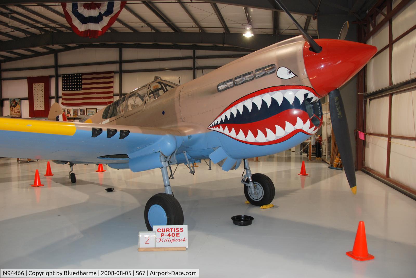N94466, 1942 Curtiss P-40E C/N AK-899, Flying Tiger Side view. On display at the Warhawk Air Museum.