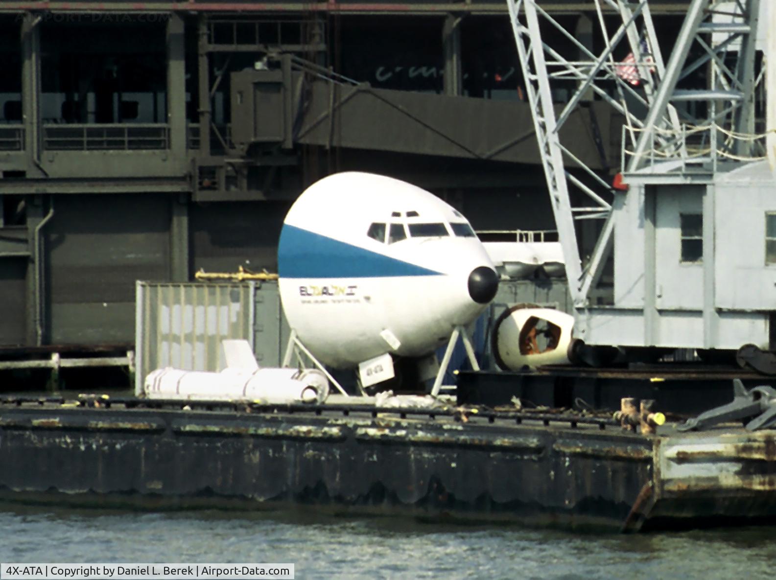 4X-ATA, 1961 Boeing 707-458 C/N 18070/205, Perched on a barge in New York harbor, the preserved nose section of this historic bird awaits transfer to her new home at the Cradle of Aviation Museum.
