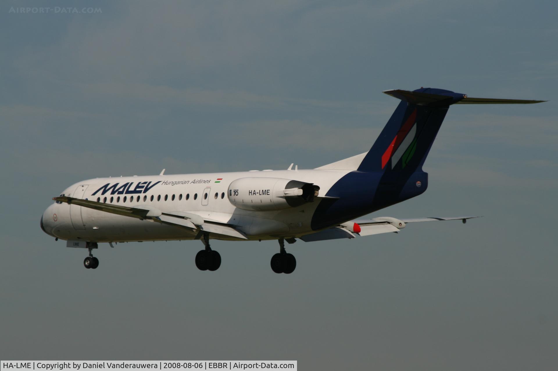 HA-LME, 1996 Fokker 70 (F-28-0070) C/N 11575, several seconds before landing on rwy 25L