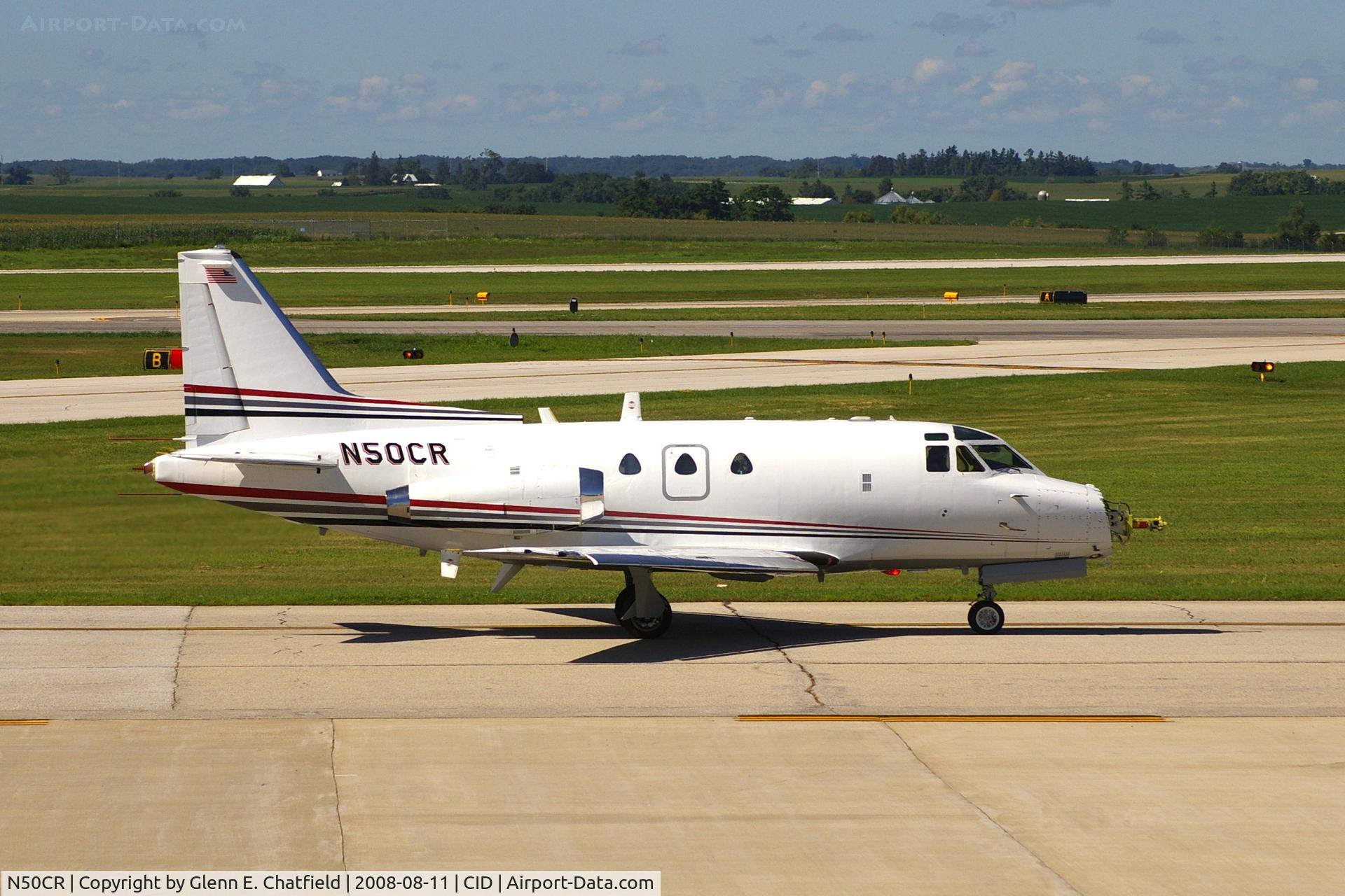 N50CR, 1964 North American NA-265-50 Saberliner C/N 287-1, Taxiing by my window back to Rockwell-Collins; notice the missing nose cone--he was just doing some tests, not flying!