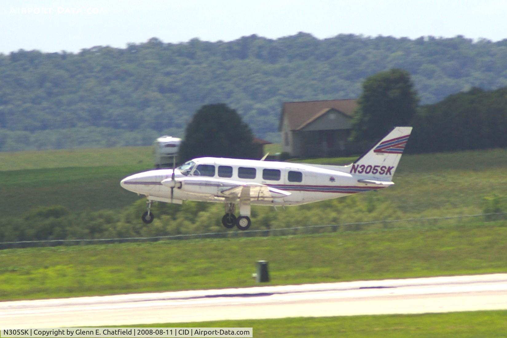 N305SK, 1975 Piper PA-31-350 Chieftain C/N 31-7652039, Departing Runway 9, photo cropped to see it much closer than the 1/4 mile it was.