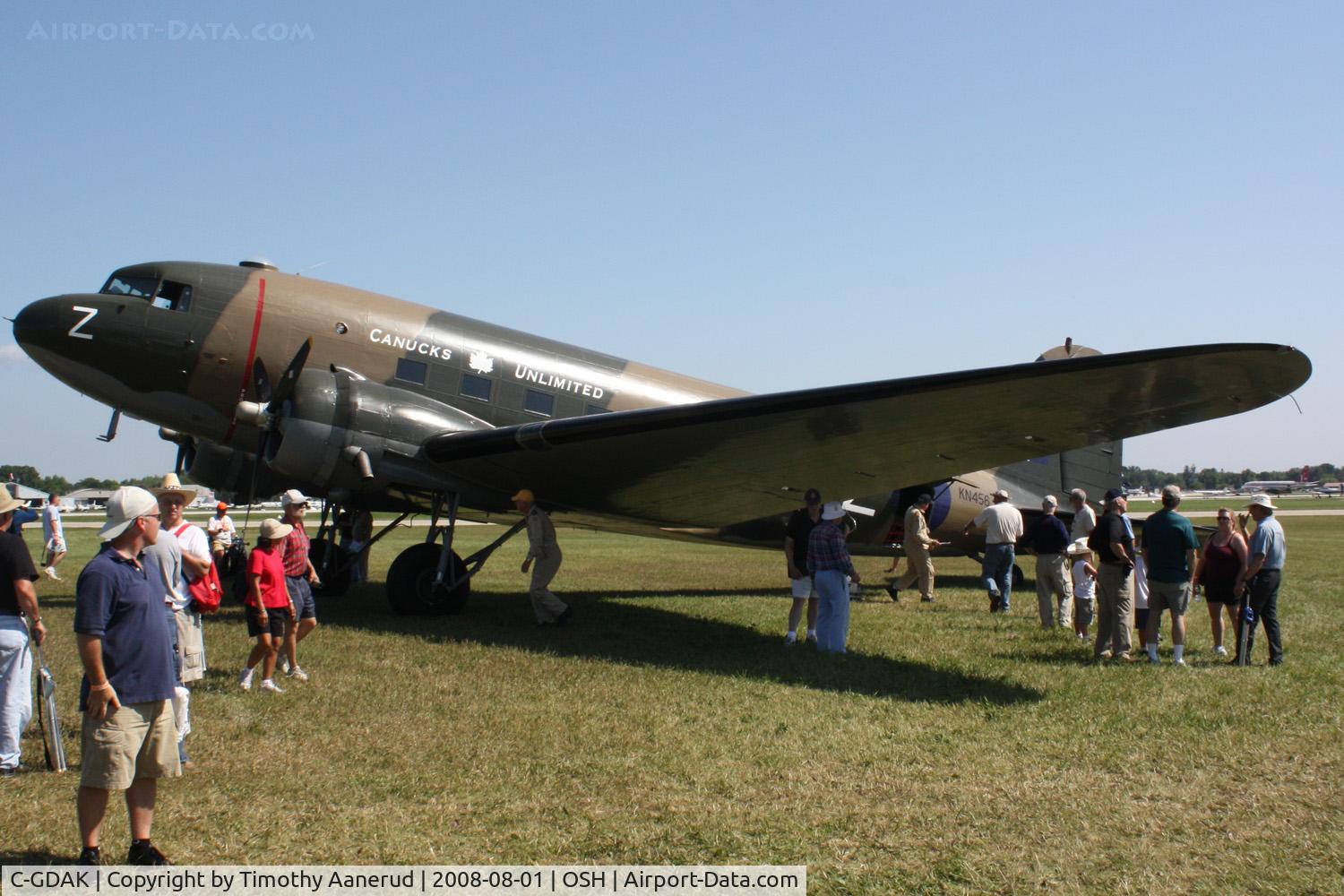 C-GDAK, 1939 Douglas DC-3-G202A C/N 2141, EAA AirVenture 2008, The highest time DC-3. It once flew as Crystal Shamrock Airlines based at the KMIC airport. Before that it served with North Central Airlines (N21729), and originally for Eastern Airlines