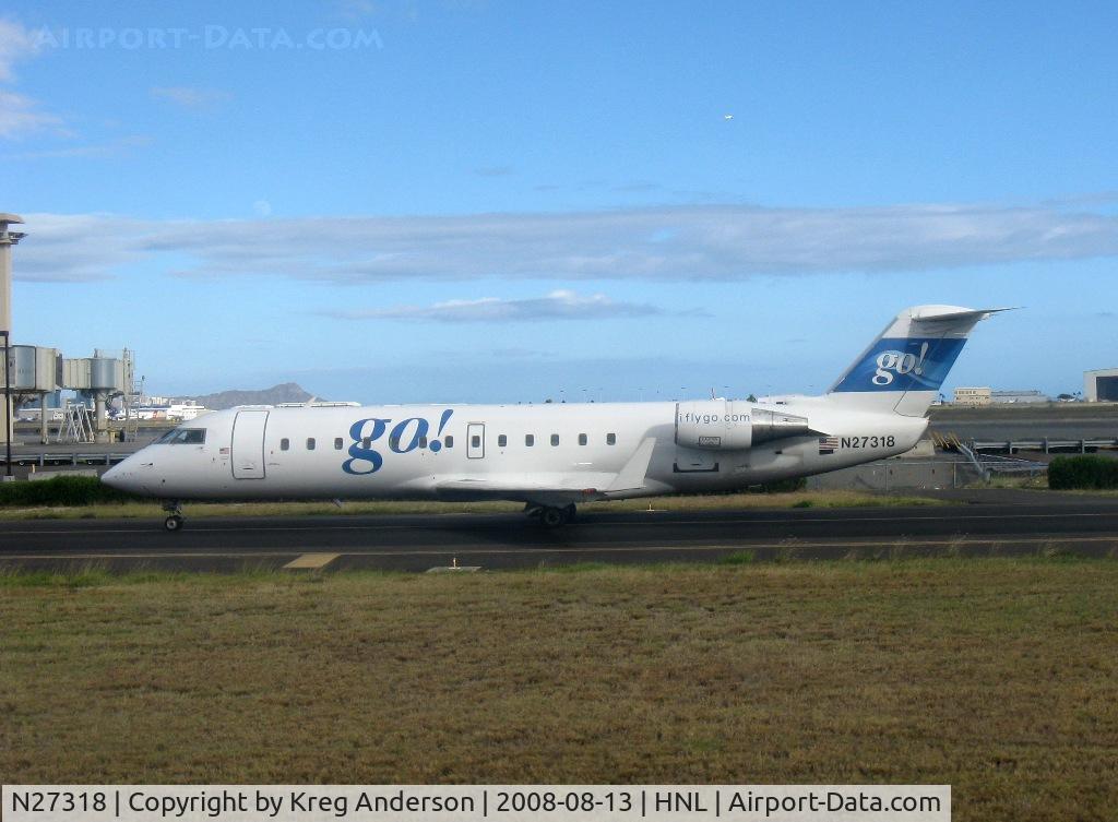 N27318, 1999 Bombardier CRJ-200LR (CL-600-2B19) C/N 7318, Passing it on the taxiway