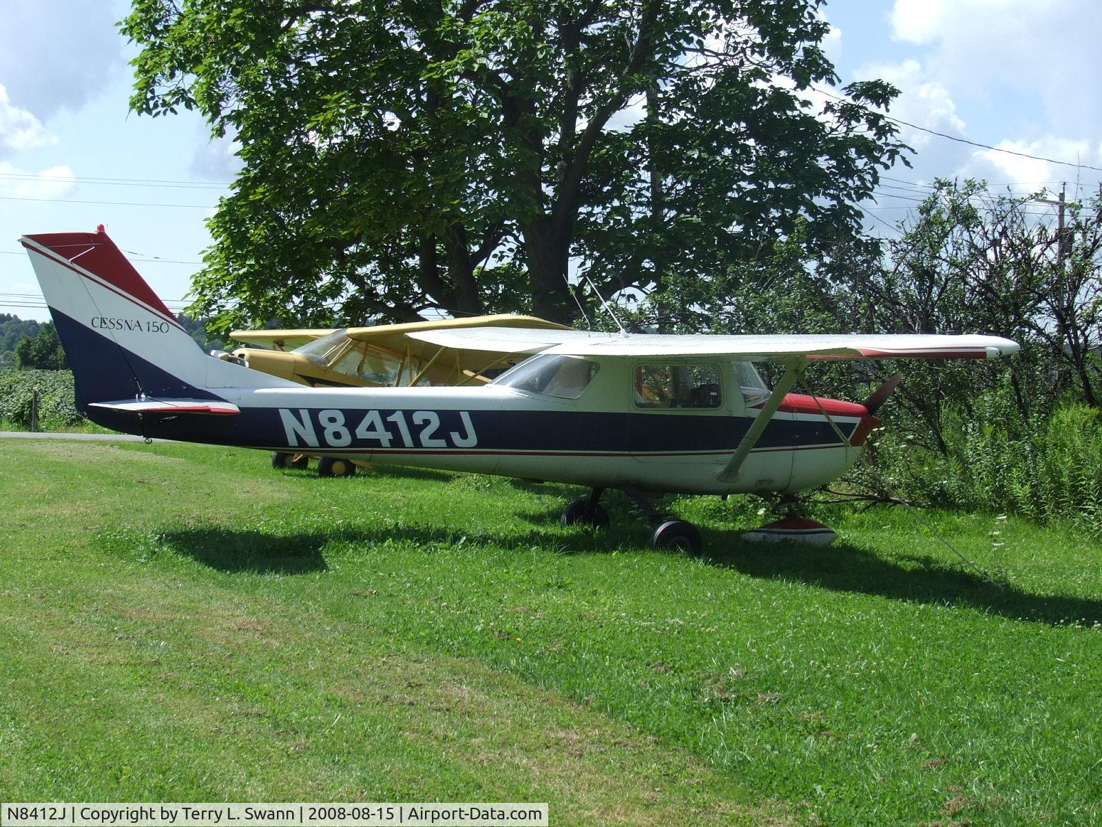 N8412J, 1967 Cessna 150G C/N 15066312, Sitting at Smith Field, Cambria, NY