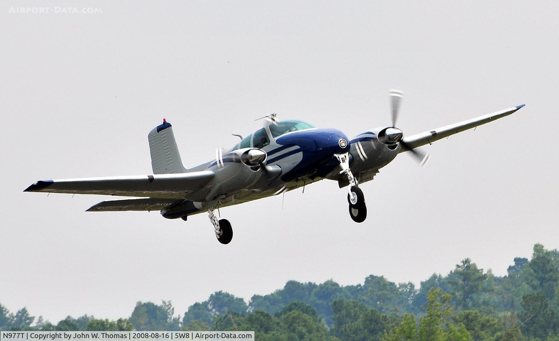 N977T, 1960 Beech D50C Twin Bonanza C/N DH-264, Departing runway 22