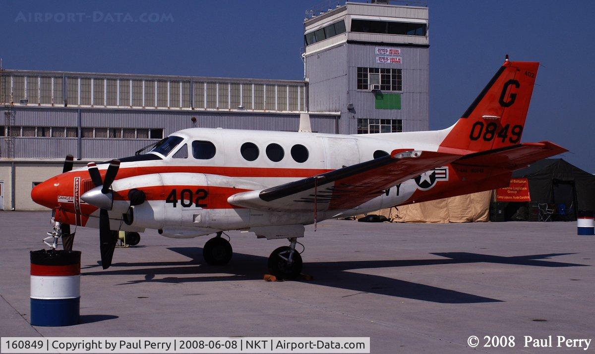 160849, 1977 Beechcraft T-44A Pegasus C/N LL-11, Framed up with the patriotic FOD barrel