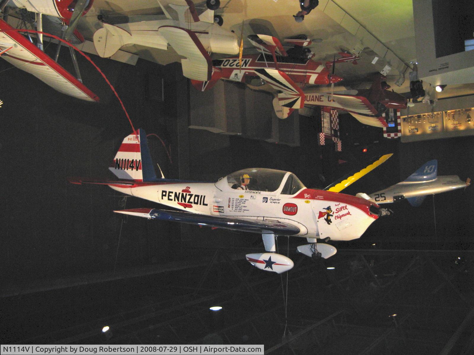 N1114V, 1950 De Havilland Canada DHC-1 Super Chipmunk C/N 116-154, 1950 DeHavilland DHC-1 Art Scholl SUPER CHIPMUNK, Lycoming GO-435 upgrade conversion. (NOTE: Image rotated 180 degrees for easier viewing)-aircraft hanging in EAA Aviation Museum