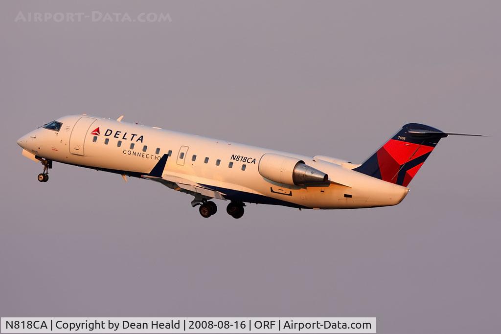 N818CA, 2000 Bombardier CRJ-100ER (CL-600-2B19) C/N 7408, Delta Connection (Comair) N818CA (FLT COM588) climbing out from RWY 5 enroute to New York John F Kennedy Int'l (KJFK). Seen here in 