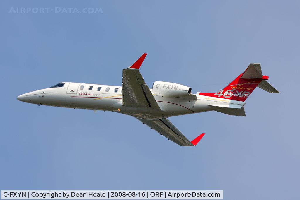 C-FXYN, 2005 Learjet 45 C/N 45-270, This nicely painted Bombardier Learjet 45XR C-FXYN is climbing out from RWY 5 enroute to Montreal-Pierre Elliott Trudeau Int'l (CYUL).