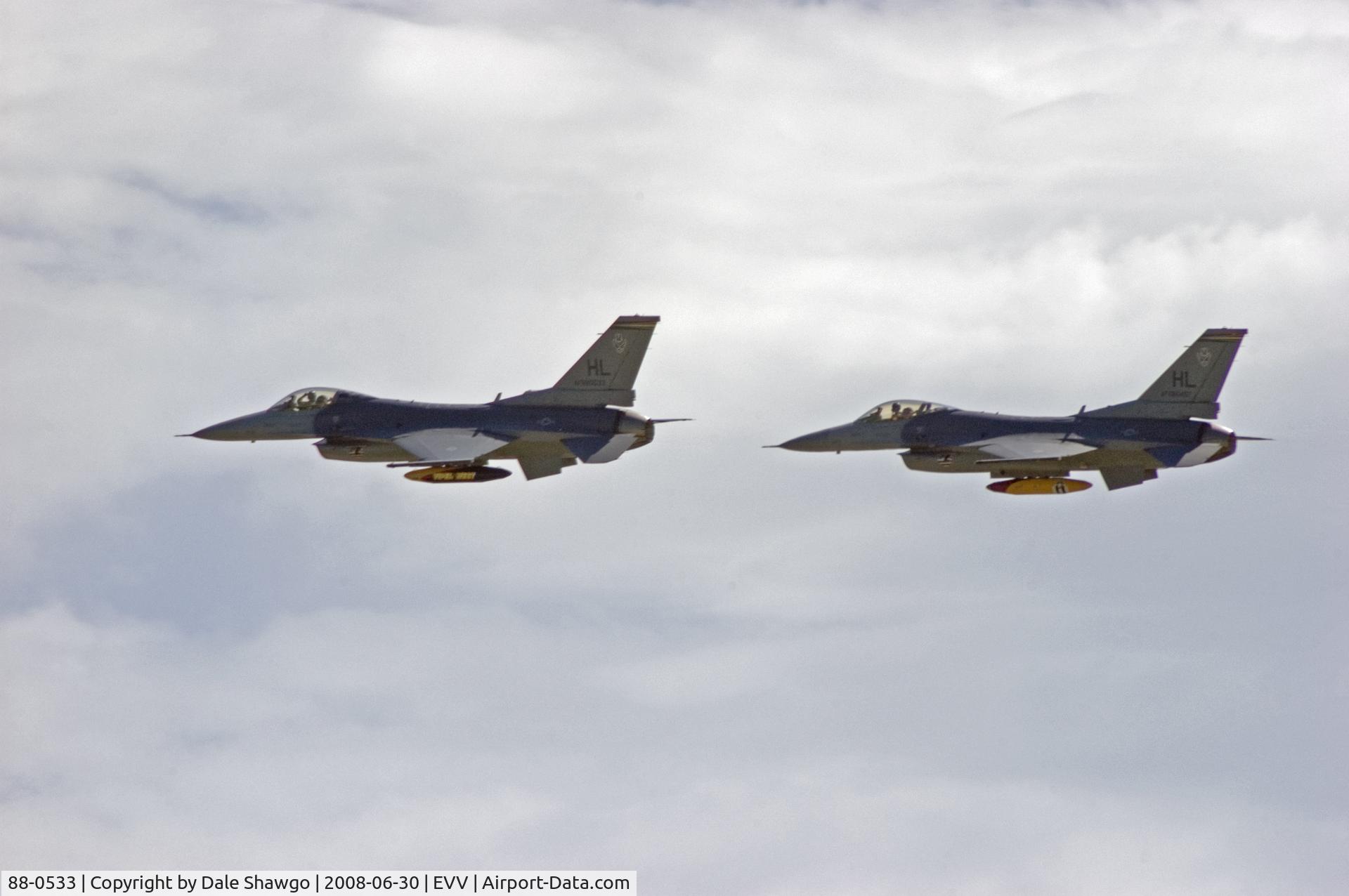 88-0533, 1988 General Dynamics F-16CG Night Falcon C/N 1C-135, SRA Israel Woodmancy & SSGT Jared Carter give a salute to the crowd as they head home from the Evansville IN Freedom Festival.