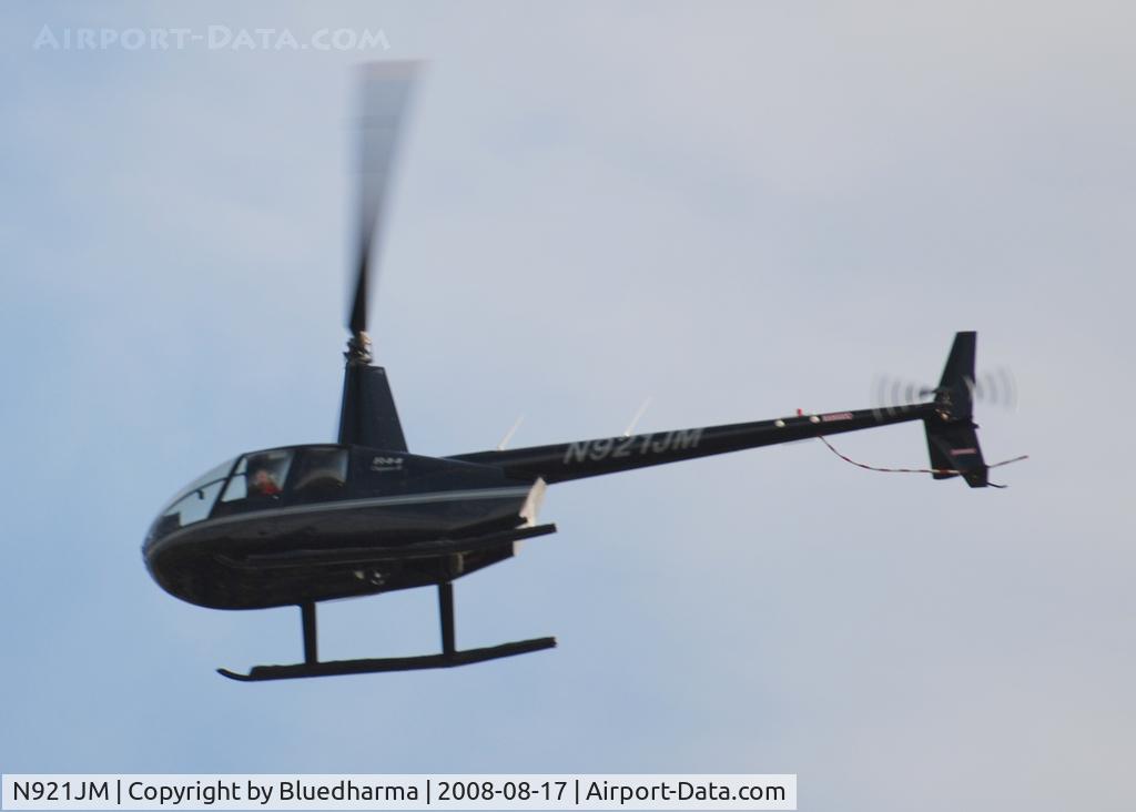 N921JM, 2004 Robinson R44 II C/N 10565, Flying over Columbine High School Littleton Colorado.