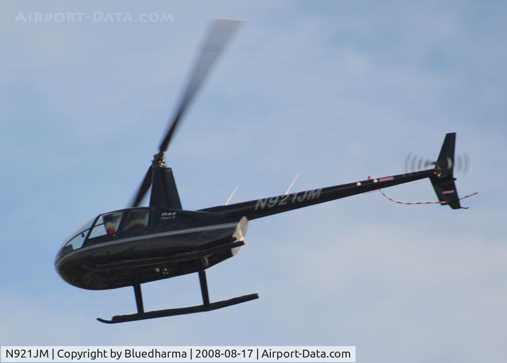 N921JM, 2004 Robinson R44 II C/N 10565, Flying over Columbine High School Littleton Colorado.