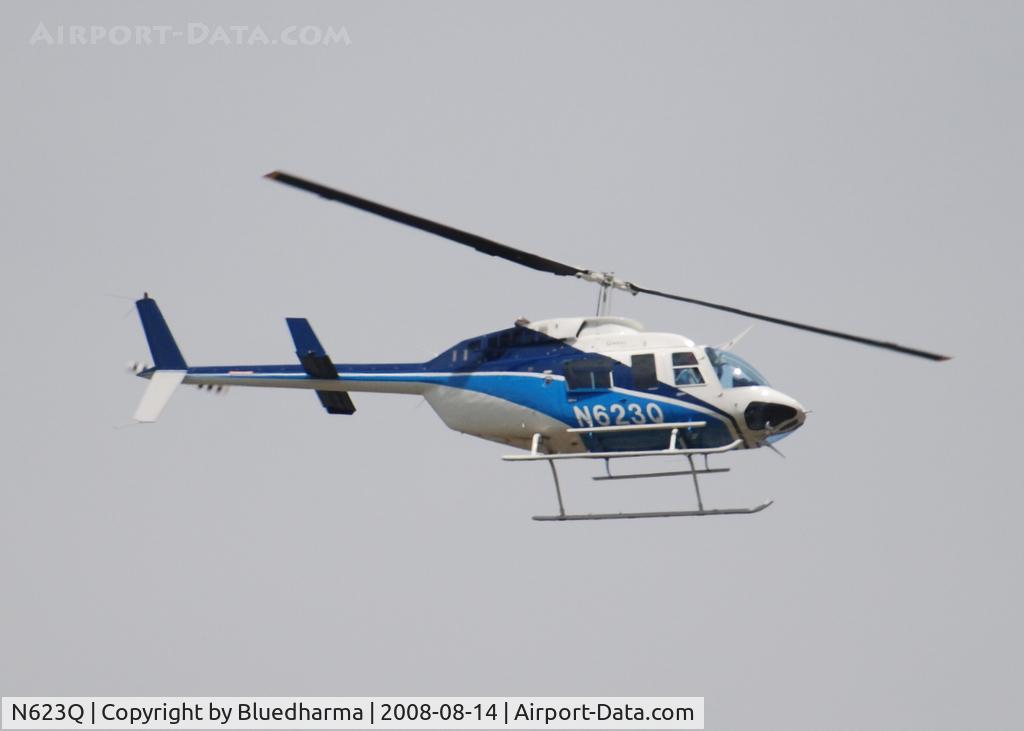 N623Q, 1988 Bell 206L-3 LongRanger III C/N 51258, Flying over Columbine Highschool Littleton Colorado heading East.