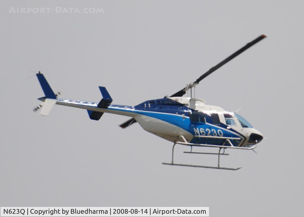 N623Q, 1988 Bell 206L-3 LongRanger III C/N 51258, Flying over Columbine Highschool Littleton Colorado heading East.