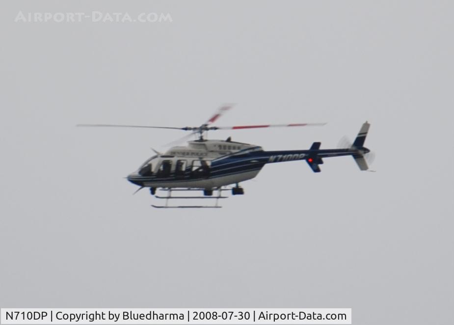 N710DP, 1998 Bell 407 C/N 53249, Denver Police fly over Columbine High School Area on patrol.