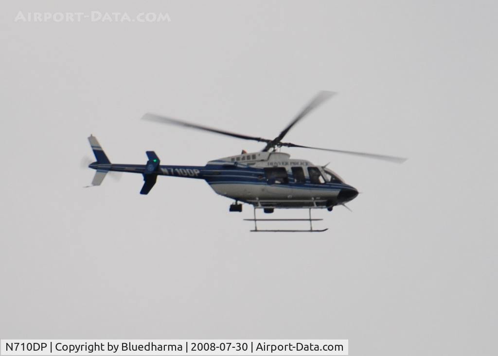 N710DP, 1998 Bell 407 C/N 53249, Denver Police fly over Columbine High School Area on patrol.