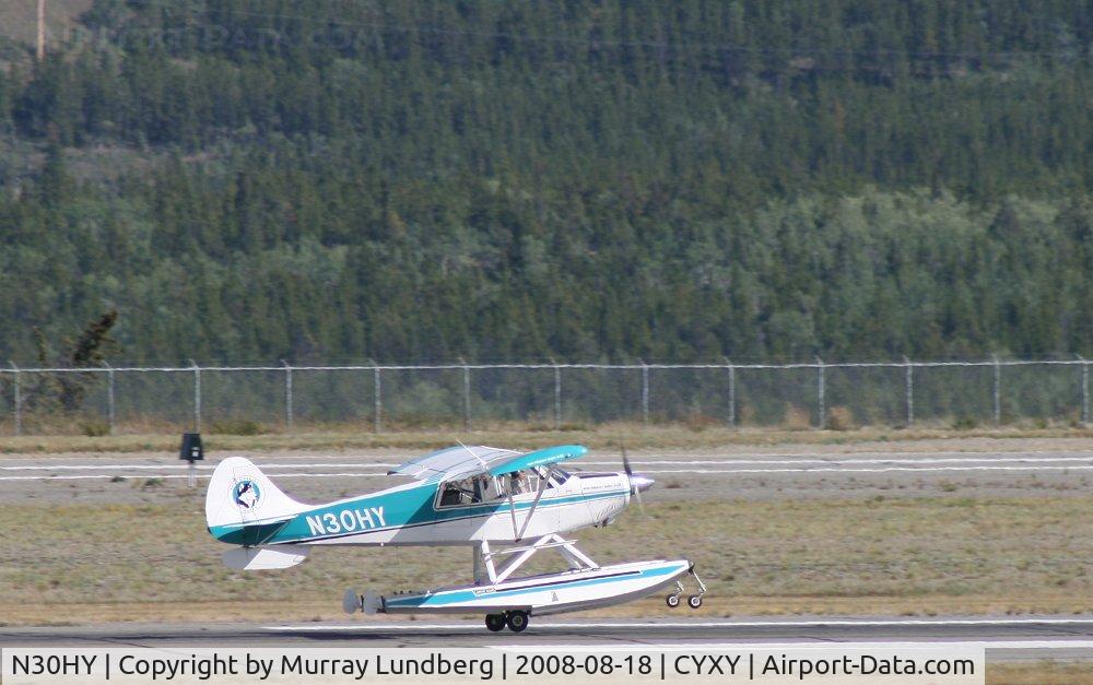 N30HY, 2000 Aviat A-1B Husky C/N 2094, Takeoff on amphibious floats at Whitehorse, Yukon.