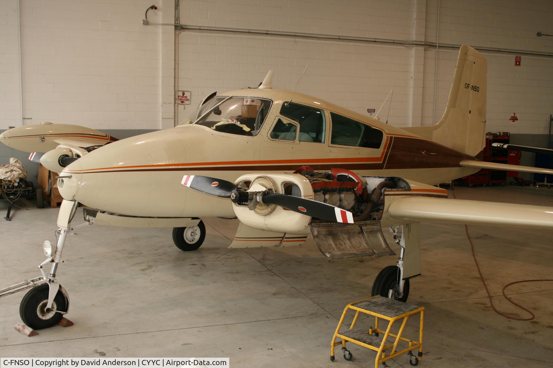 C-FNSO, 1957 Cessna 310 C/N 35535, Undergoing maintenance at YYC