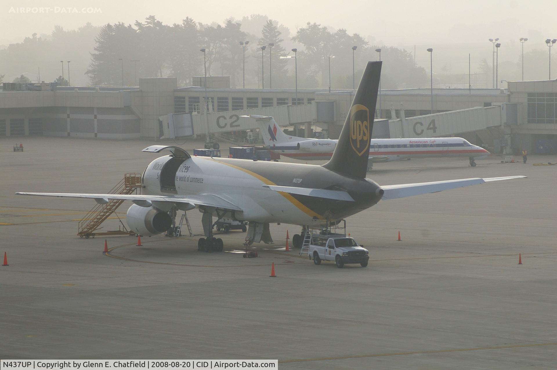 N437UP, 1994 Boeing 757-24APF C/N 25468, Early morning fog on the UPS ramp.  Fog is clearing