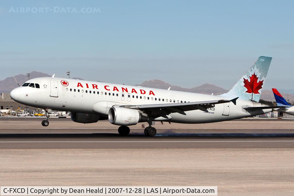 C-FXCD, 2003 Airbus A320-214 C/N 2018, Air Canada C-FXCD touching down on RWY 25L.