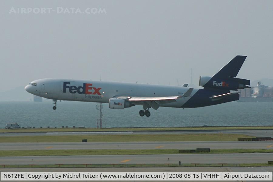 N612FE, 1993 McDonnell Douglas MD-11F C/N 48605, Fedex landing at Hong Kong