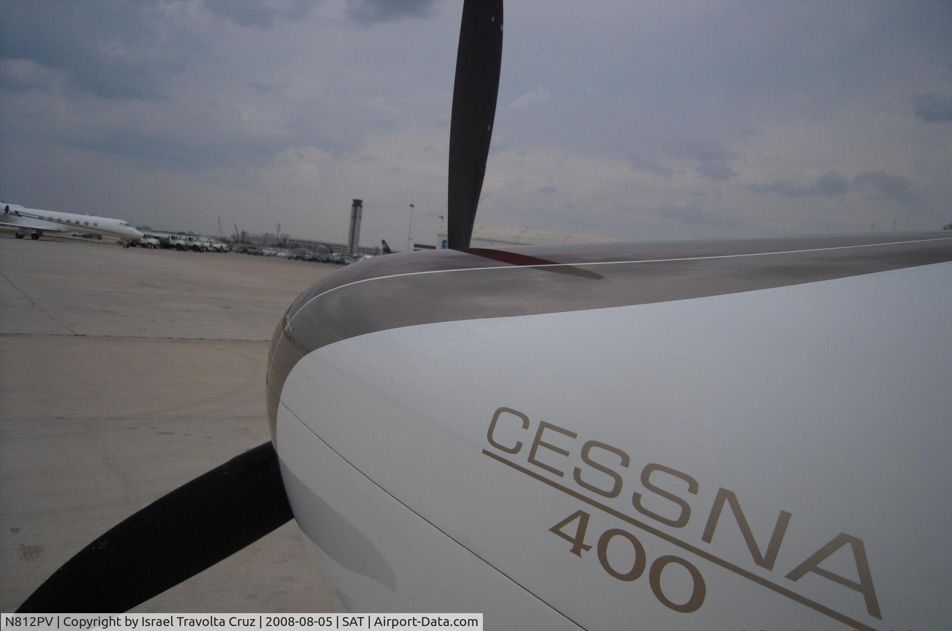 N812PV, 2007 Columbia Aircraft Mfg LC41-550FG C/N 41737, Cessna 400 at San antonio Intl. On the back the control Tower.