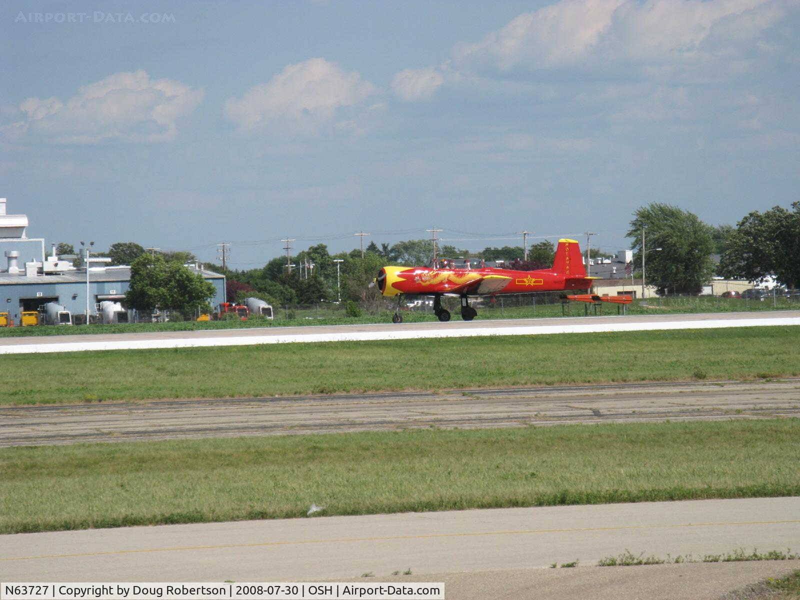 N63727, 1977 Nanchang CJ-6A C/N 1832035, 1977 Nanchang China CJ-6A as NX63727 'NOTAYAK', Huosai 6A 9 cylinder radial 285 Hp, landing roll Rwy 36
