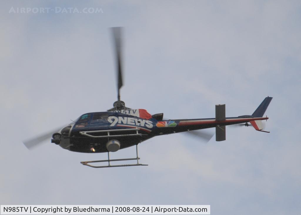 N985TV, 2003 Eurocopter AS-350B-3 Ecureuil Ecureuil C/N 3749, Channel 9 News heading North West around Columbine High School Littleton Colorado.