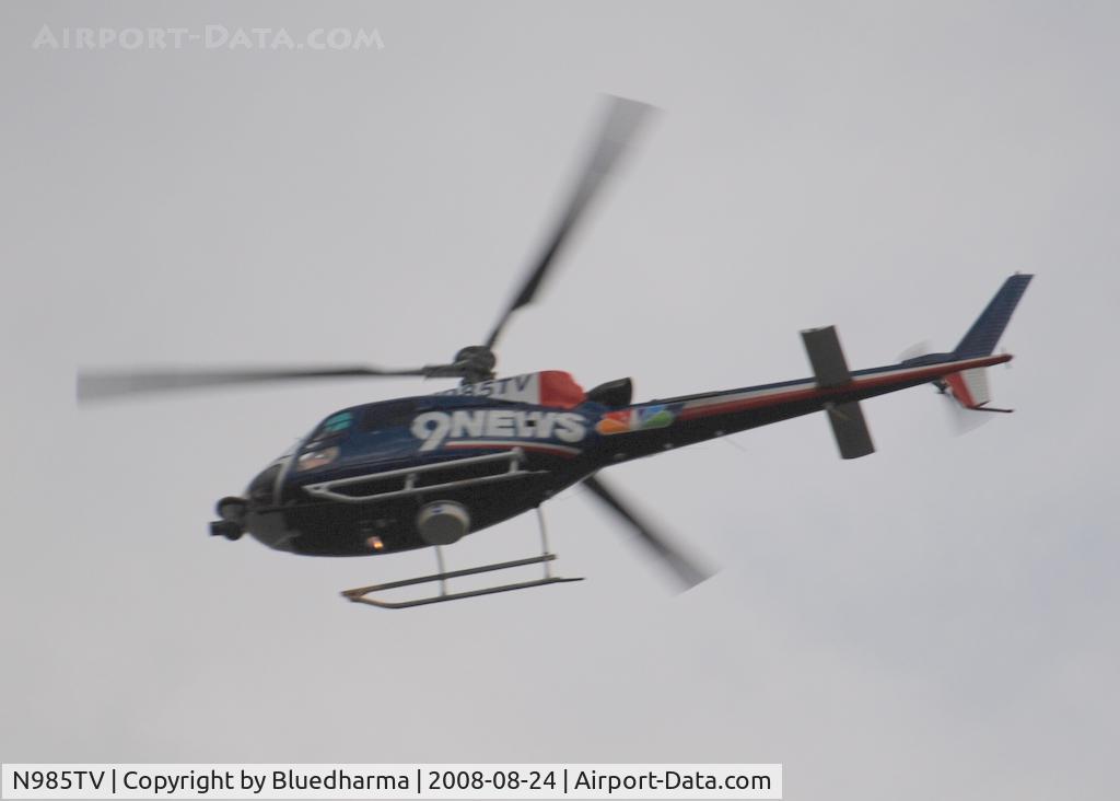 N985TV, 2003 Eurocopter AS-350B-3 Ecureuil Ecureuil C/N 3749, Channel 9 News heading North West around Columbine High School Littleton Colorado.