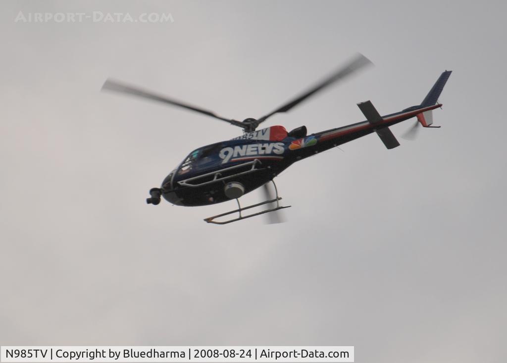 N985TV, 2003 Eurocopter AS-350B-3 Ecureuil Ecureuil C/N 3749, Channel 9 News heading North West around Columbine High School Littleton Colorado.