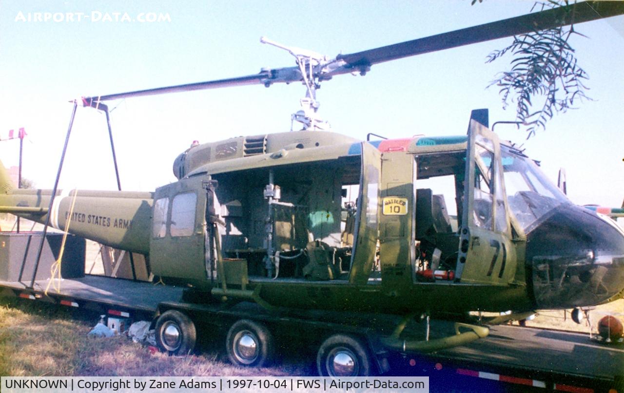 UNKNOWN, , UH-1H Vietnam helicopter traveling display.