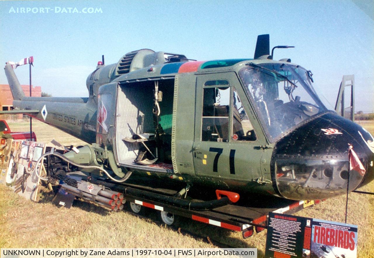 UNKNOWN, , UH-1B Vietnam helicopter traveling display.