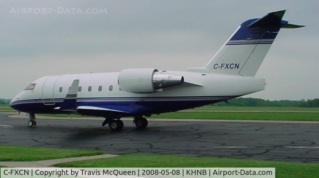 C-FXCN, 2000 Bombardier Challenger 604 (CL-600-2B16) C/N 5474, Parked on ramp at KHNB