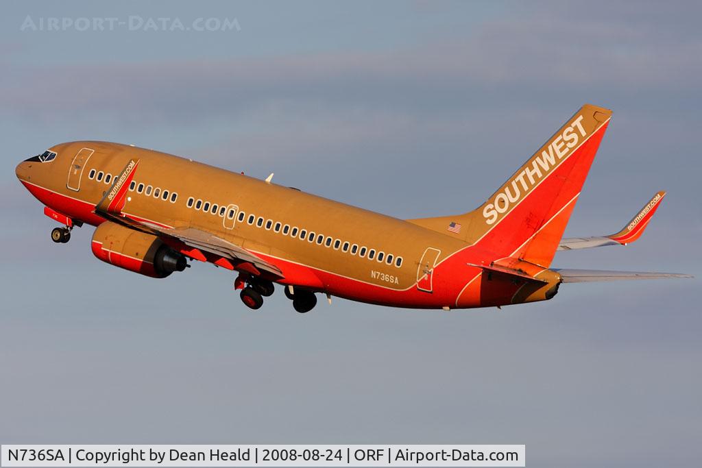 N736SA, 1999 Boeing 737-7H4 C/N 27868, Southwest Airlines N736SA (FLT SWA1665) climbing out from RWY 5 enroute to Chicago Midway Int'l (KMDW).