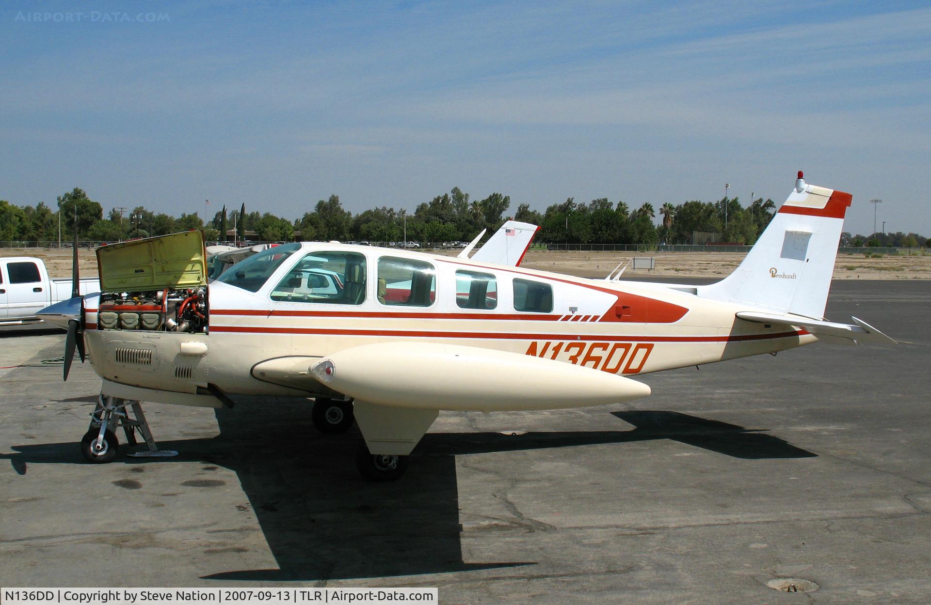 N136DD, 1981 Beech A36TC Bonanza 36 C/N EA-212, 1981 Beech A36TC with engine panel open at Mefford Field, Tulare, CA