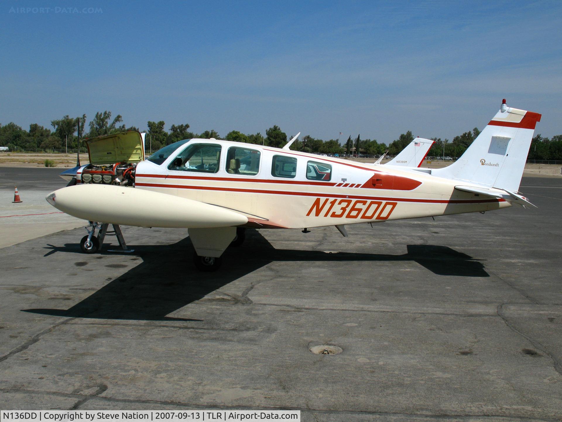 N136DD, 1981 Beech A36TC Bonanza 36 C/N EA-212, 1981 Beech A36TC with engine panel open at Mefford Field, Tulare, CA