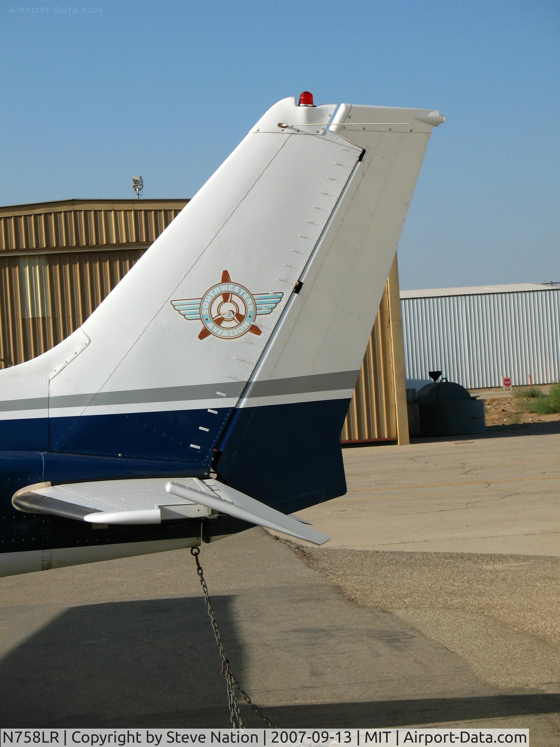 N758LR, 1979 Cessna R172K Hawk XP C/N R1723185, close-up Southwestern Aviation logo on 1979 Cessna 172K @ Shafter, CA
