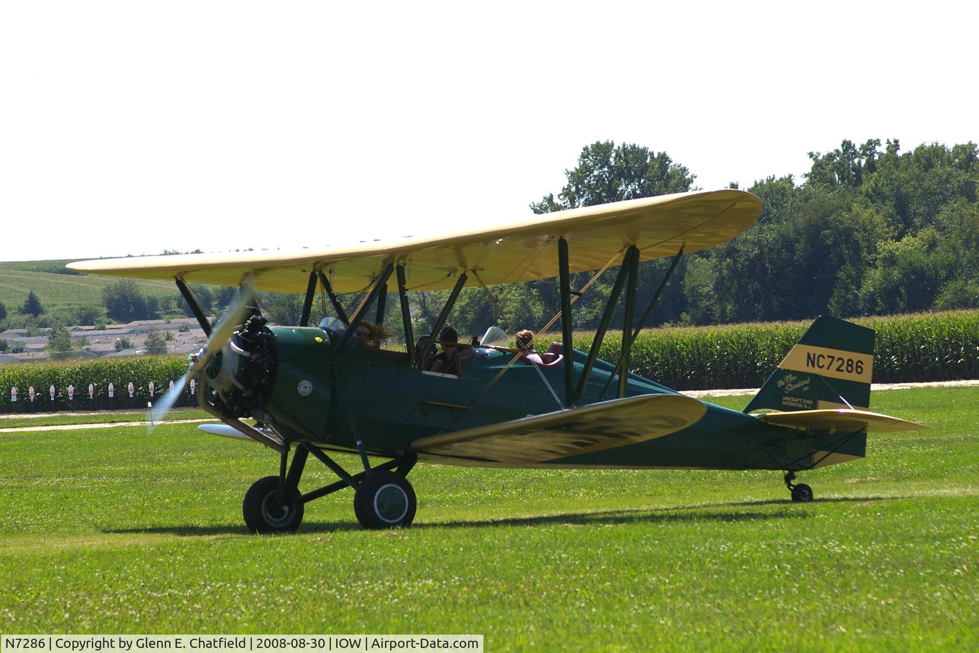N7286, 1941 New Standard D-25A C/N 167W, Taxiing to the ramp with the mail.