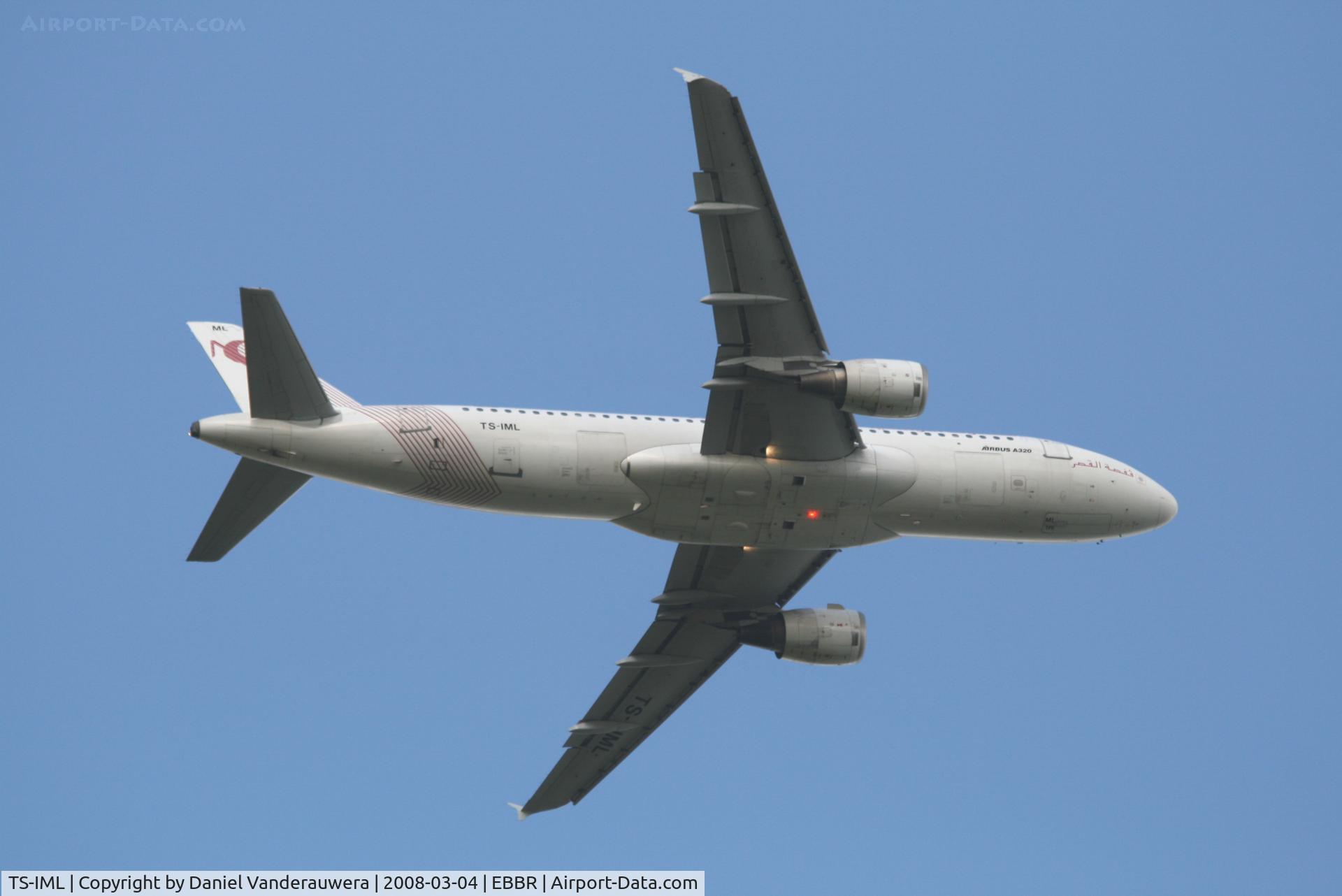 TS-IML, 1999 Airbus A320-211 C/N 0958, taking off from rwy 07R