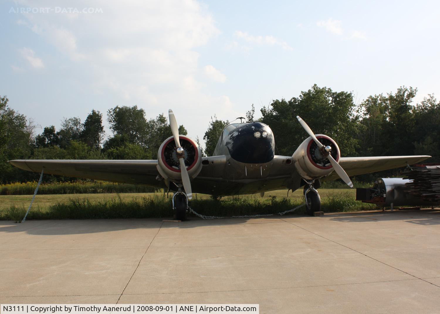 N3111, 1953 Beech D18S C/N A-964, Parked at Anoka County